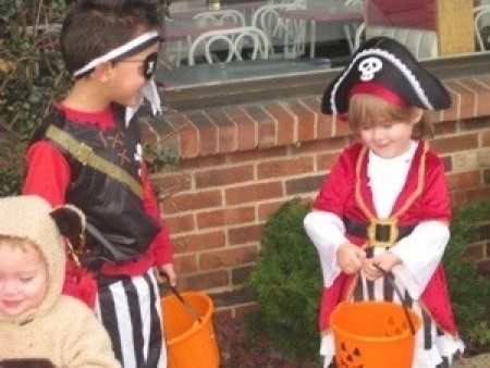 Children on Halloween dressed as pirates.