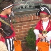 Children on Halloween dressed as pirates.