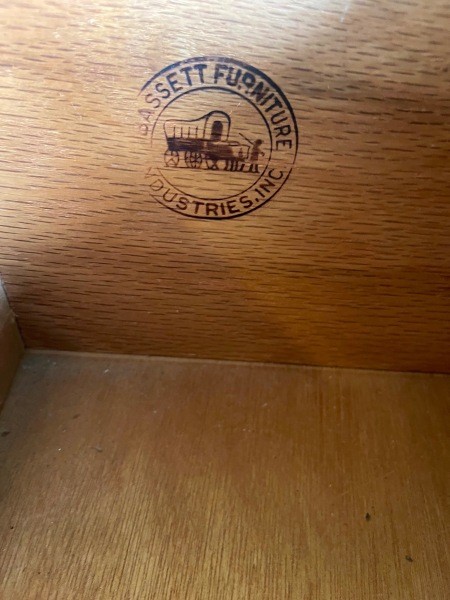The Bassett logo inside a drawer.