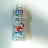 A recycled ICEE package frozen with water inside.