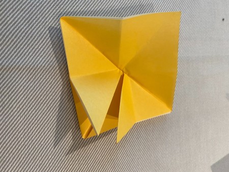 Folding the center of the flower.