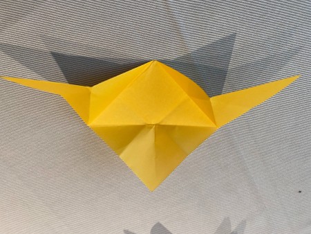 Folding the center of the flower.