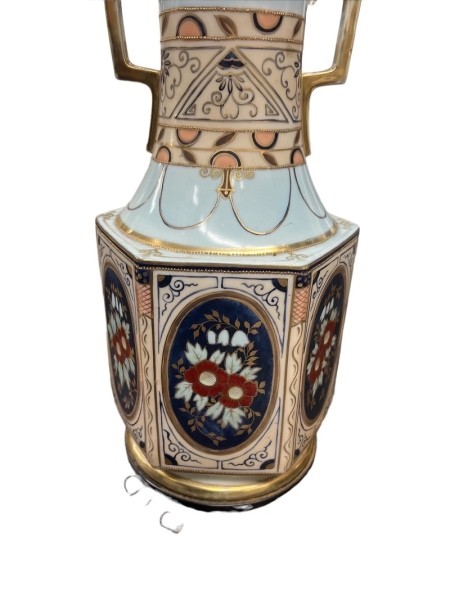 A close up of the decorative vase.