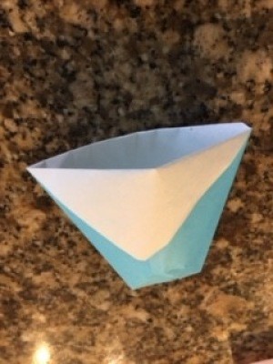 A small origami cup.