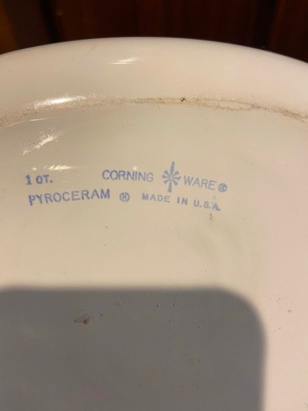 Markings on the back of a piece of Corningware.
