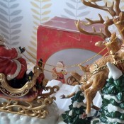 A Santa and reindeer ornament.
