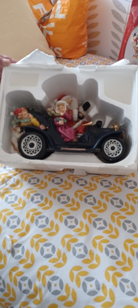 A Santa ornament still in packaging.