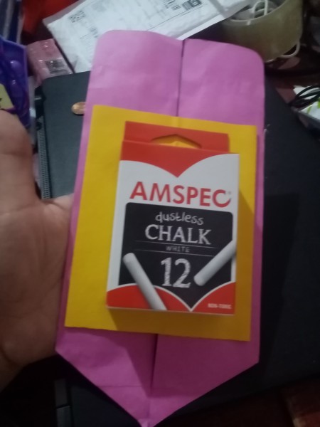 A box of chalk on the back of a card.