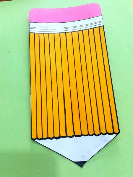 Adding a black tip and pink paper as an eraser.