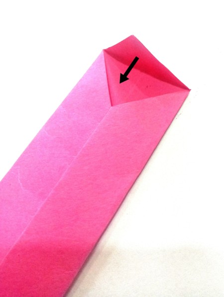 Folding the necktie.