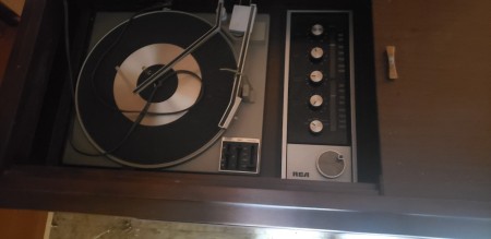 A record player in the console stereo.
