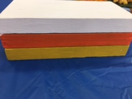 The three painted pieces of wood.