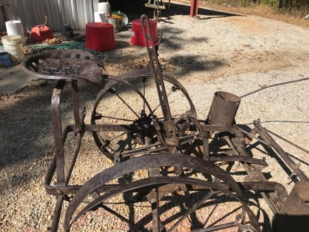 An antique metal planter.