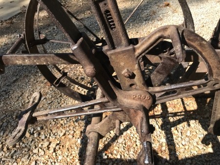 An antique metal planter.