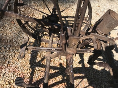 An antique metal planter.