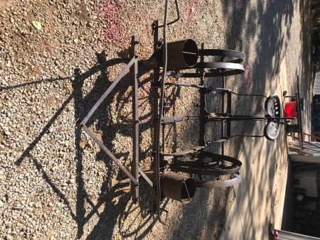 An antique metal planter.