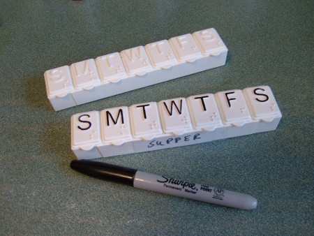 Two day of the week pill boxes.