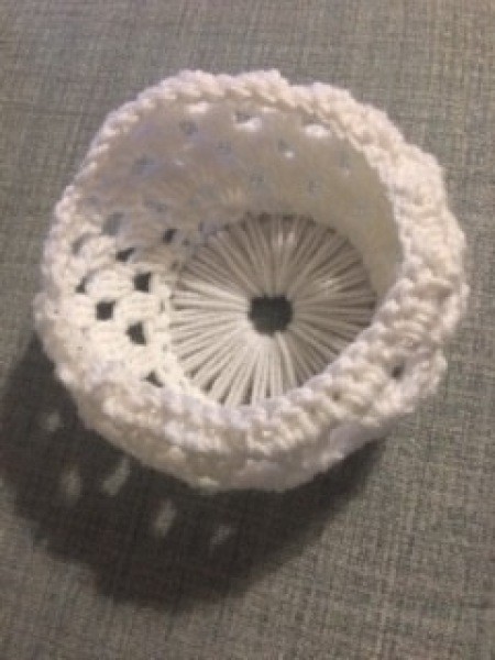 The completed crocheted basket.
