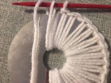 Crocheting around a recycled CD