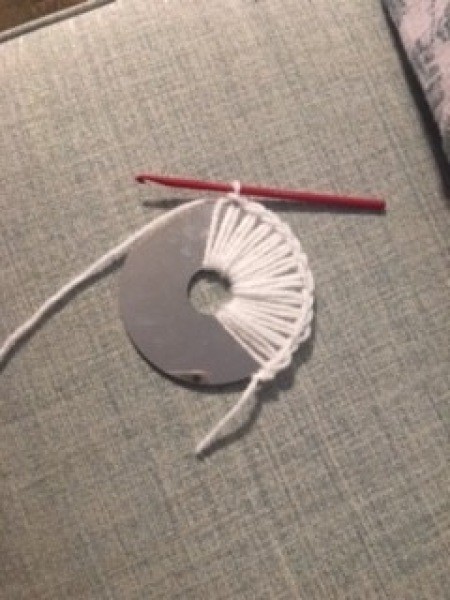 Crocheting around a recycled CD