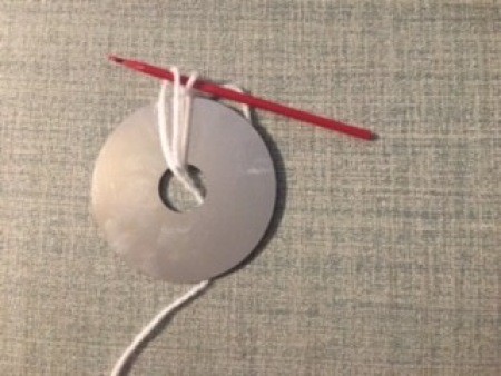 Crocheting around a recycled CD