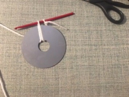 Crocheting around a recycled CD