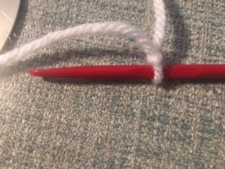 Starting yarn on a crochet hook.