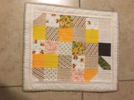 The completed patchwork table topper.