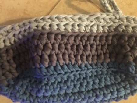 Crocheting the top of the basket.