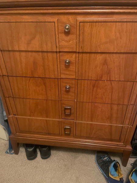 A tall 5 drawer dresser.