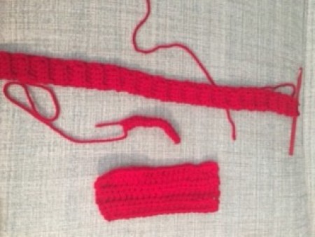 The crocheted pieces to assemble the bow tie.