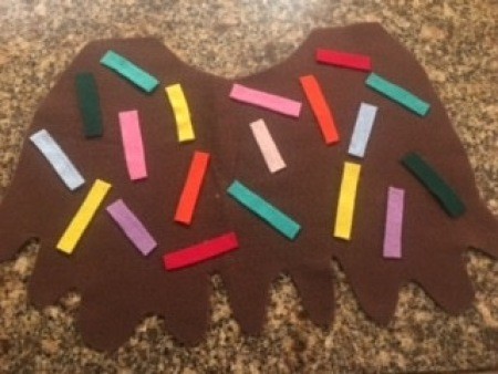 Adding "sprinkles" to the chocolate ice cream.