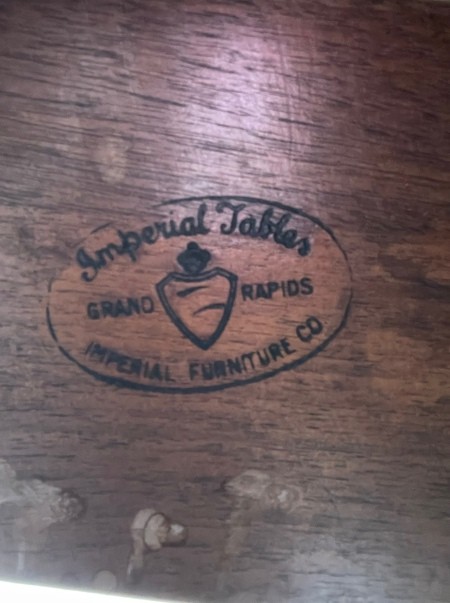 The marking on the underside of the table.