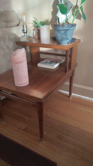 A wooden end table.