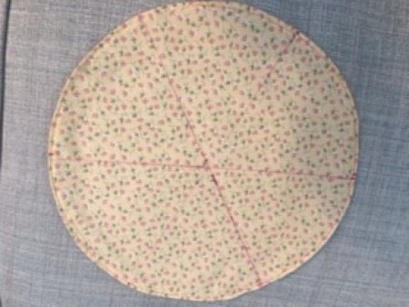 Marking out even pie shaped wedges on the base.