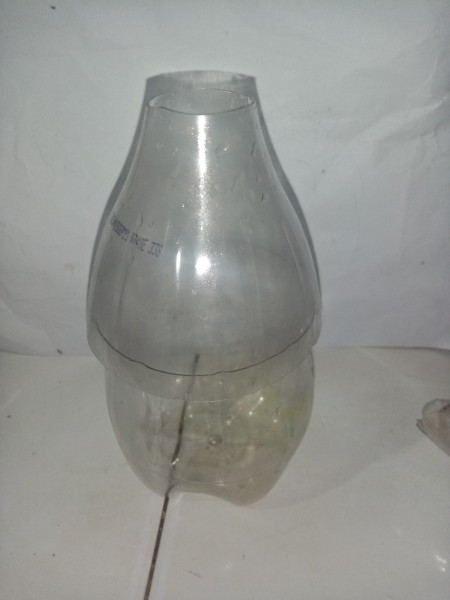 Placing the bottle pieces together.