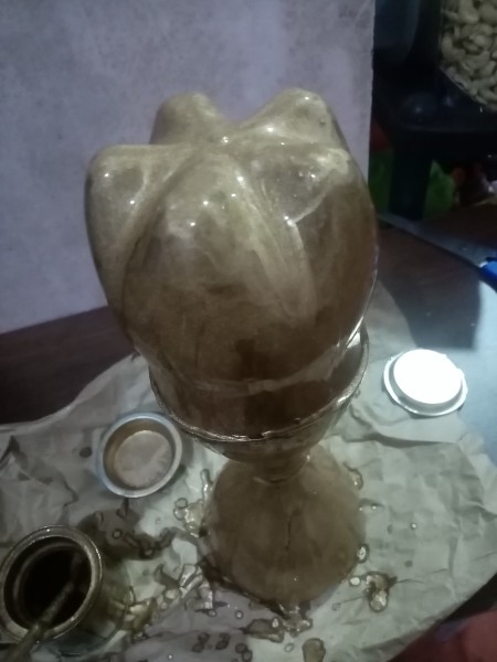 Painting the plastic gold.