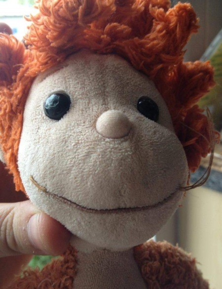 A close up of a monkey toy.