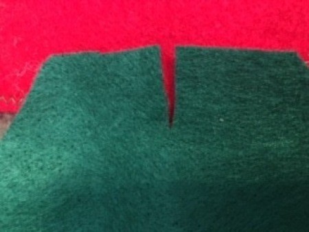 Combining the red and green felt pieces.