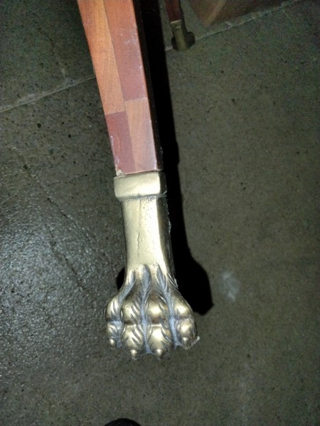 The claw foot of the side table.