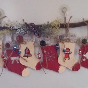 Stockings hung on a branch as a Christmas decoration.