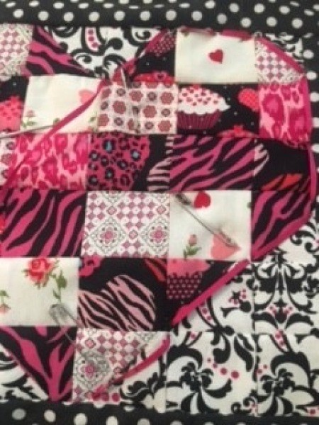 Tracing the heart with ribbon.