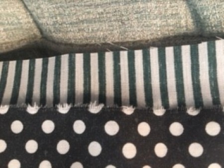 Adding a border to the quilt.