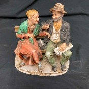 A figurine of an old couple.