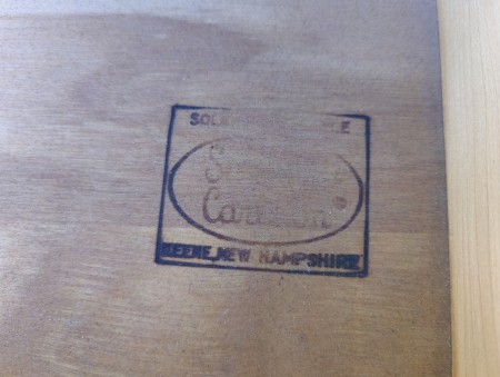 The manufacturer's stamp inside the drawer.