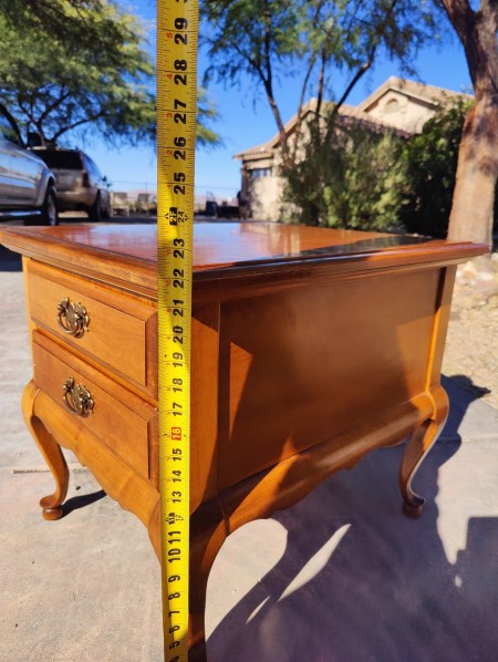 The side measurement of the end table.