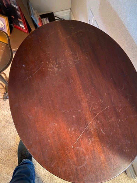 A wooden oval table.