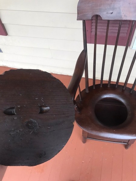 A wooden potty chair.