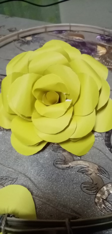 A yellow paper flower.