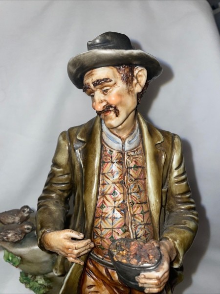 A figurine of an older man.